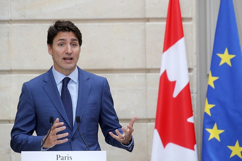 Canadian Prime Minister Justin Trudeau speaks during a joint press conference with French President Emmanuel Macron at the Elysee Palace in Paris, France, Friday, June 7, 2019. (Philippe Wojazer/Pool via AP)

