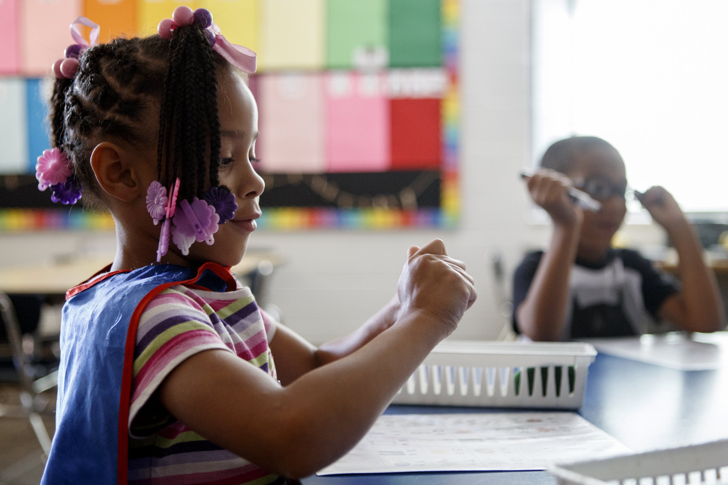 Camp K attendee KiLeigh works on writing her name at Bess T. Shepherd Elementary School on Tuesday, June 11, 2019 in Chattanooga, Tenn. During the month of June, Camp K is providing over 400 rising kindergartners across 15 Hamilton County public schools access to foundational English and literacy skills and social-emotional experiences.