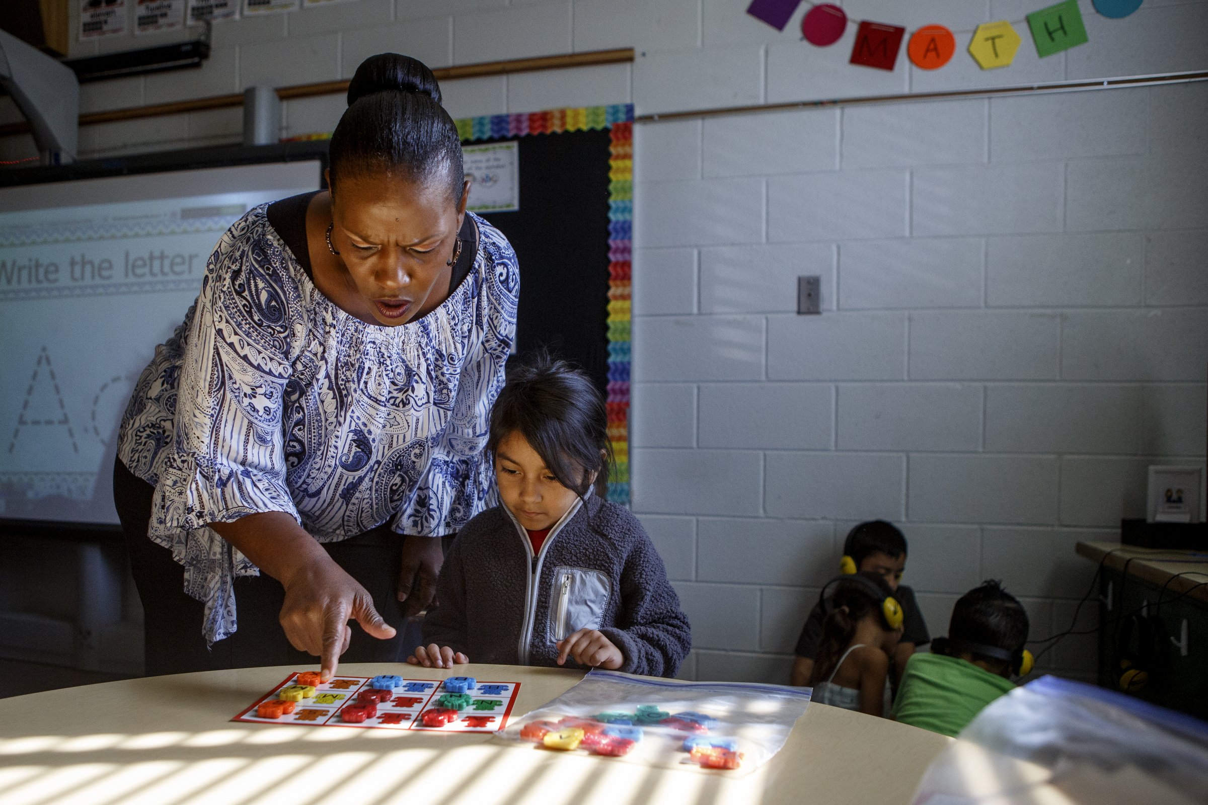 Education assistant Patricia Eady, left, works with Marlia during Camp K at Bess T. Shepherd Elementary School on Tuesday, June 11, 2019 in Chattanooga, Tenn. During the month of June, Camp K is providing over 400 rising kindergartners across 15 Hamilton County public schools access to foundational English and literacy skills and social-emotional experiences.