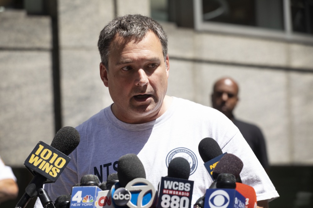 Doug Brazy, an investigator with the National Transportation Safety Board, leaves a news conference, Tuesday, June 11, 2019 in New York. He gave an update on Monday's helicopter crash on the roof of a rain-shrouded Manhattan skyscraper, which killed the pilot, Tim McCormack, of Clinton Corners, N.Y. (AP Photo/Mark Lennihan)