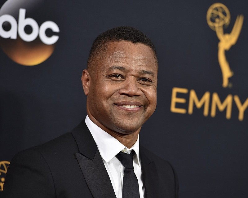 FILE- In this Sept. 18, 2016 file photo, Cuba Gooding Jr. arrives at the 68th Primetime Emmy Awards in Los Angeles. Gooding is expected to turn himself in to the New York Police Department on Thursday, June 13, 2019, after being accused of groping a woman at a midtown Manhattan nightclub Sunday, June 9. (Photo by Jordan Strauss/Invision/AP, File)

