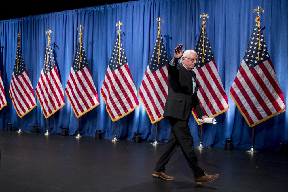 Democratic presidential candidate Sen. Bernie Sanders, I-Vt., departs after speaking at George Washington University in Washington, Wednesday, June 12, 2019, on his policy of democratic socialism, the economic philosophy that has guided his political career. (AP Photo/Andrew Harnik)