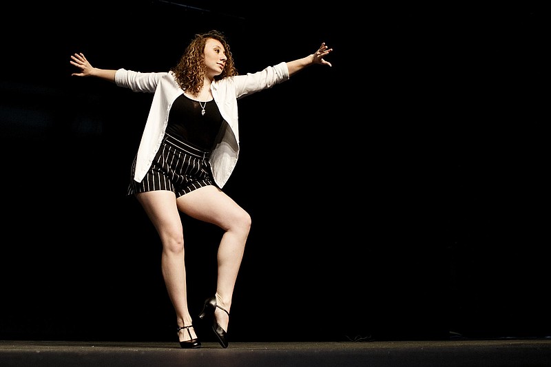Hannah Rollins dances during a photo shoot at the Chattanooga Theatre Centre on Wednesday, May 29, 2019 in Chattanooga, Tenn. Rollins is the valedictorian at Hamilton County Collegiate High.