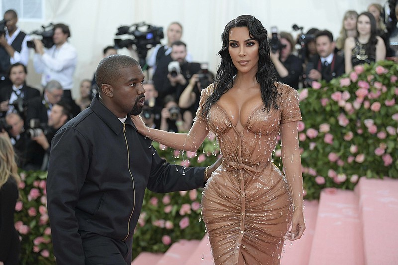 Kim Kardashian West, shown with her husband Kanye West at the Metropolitan Museum of Art's Costume Institute benefit gala in New York last month, said she wants to become an attorney with going to law school. (Nina Westervelt/The New York Times)