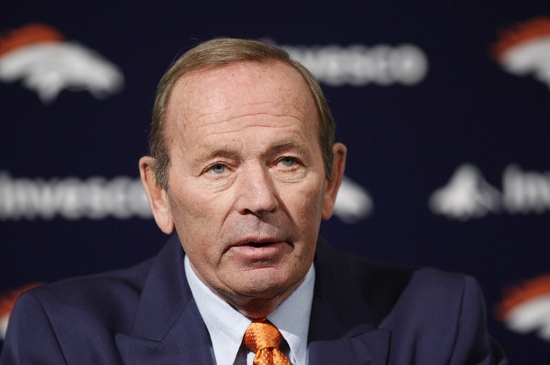 In this Jan. 5, 2011, photo from a news conference in Englewood, Colo., Denver Broncos owner Pat Bowlen talks about Hall of Fame quarterback John Elway, the team's former star he named executive vice president of football operations. Bowlen died late Thursday. He was 75.