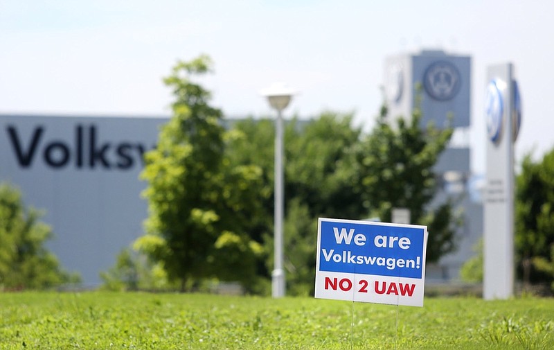 A sign against unionization is in the grass in front of the Volkswagen plant Friday, June 14, 2019, in Chattanooga, Tennessee.