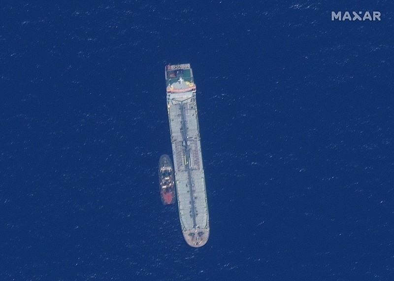 This satellite image provided by Maxar Technologies shows the oil tanker Kokuka Courageous off the coast of Fujairah, United Arab Emirates, Monday, June 17, 2019. New satellite photos released Monday show two oil tankers apparently attacked in the Gulf of Oman last week. The U.S. alleges Iran used limpet mines to strike the two tankers. Iran has denied being involved. (Satellite image 2019 Maxar Technologies via AP)
