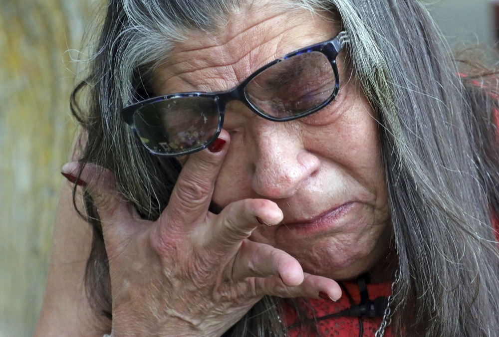 I have to get out of here! she screamed. (AP Photo/Rick Bowmer)