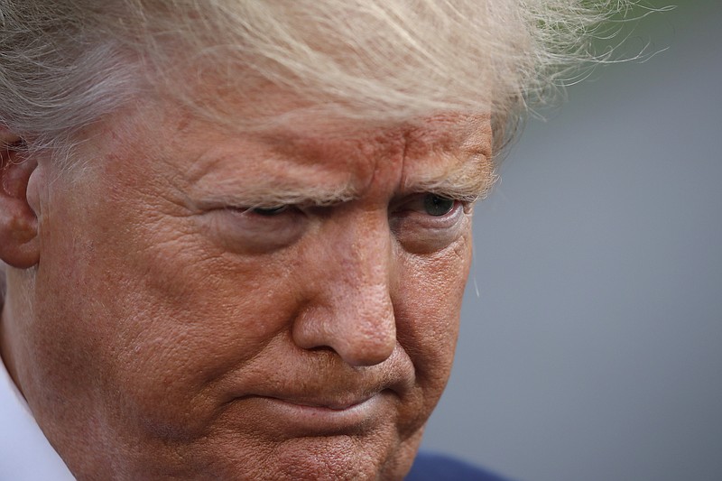 President Donald Trump speaks with the media before boarding Marine One on the South Lawn of the White House, Tuesday. Trump was en route to Orlando, Fla., to announce his bid for re-election.(AP Photo/Alex Brandon)