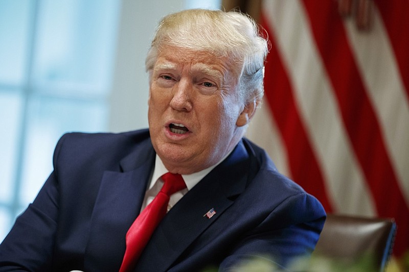 In this Thursday, June 13, 2019, file photo, President Donald Trump speaks during a meeting in the Cabinet Room of the White House, in Washington. In a tweet late Monday, June 17, 2019, Trump said that U.S. Immigration and Customs Enforcement will begin removing millions of people who are in the country illegally. (AP Photo/Evan Vucci, File)