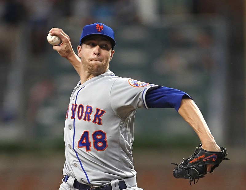 New York Mets starting pitcher Jacob deGrom (48) delivers in the fourth inning of a baseball game against the Atlanta Braves Tuesday, June 18, 2019, in Atlanta. (AP Photo/John Bazemore)