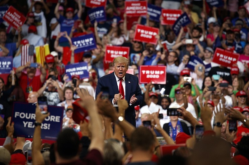 President Donald Trump reacts to the crowd after speaking during his re-election kickoff rally at the Amway Center, Tuesday, June 18, 2019, in Orlando, Florida. (AP Photo/Evan Vucci)