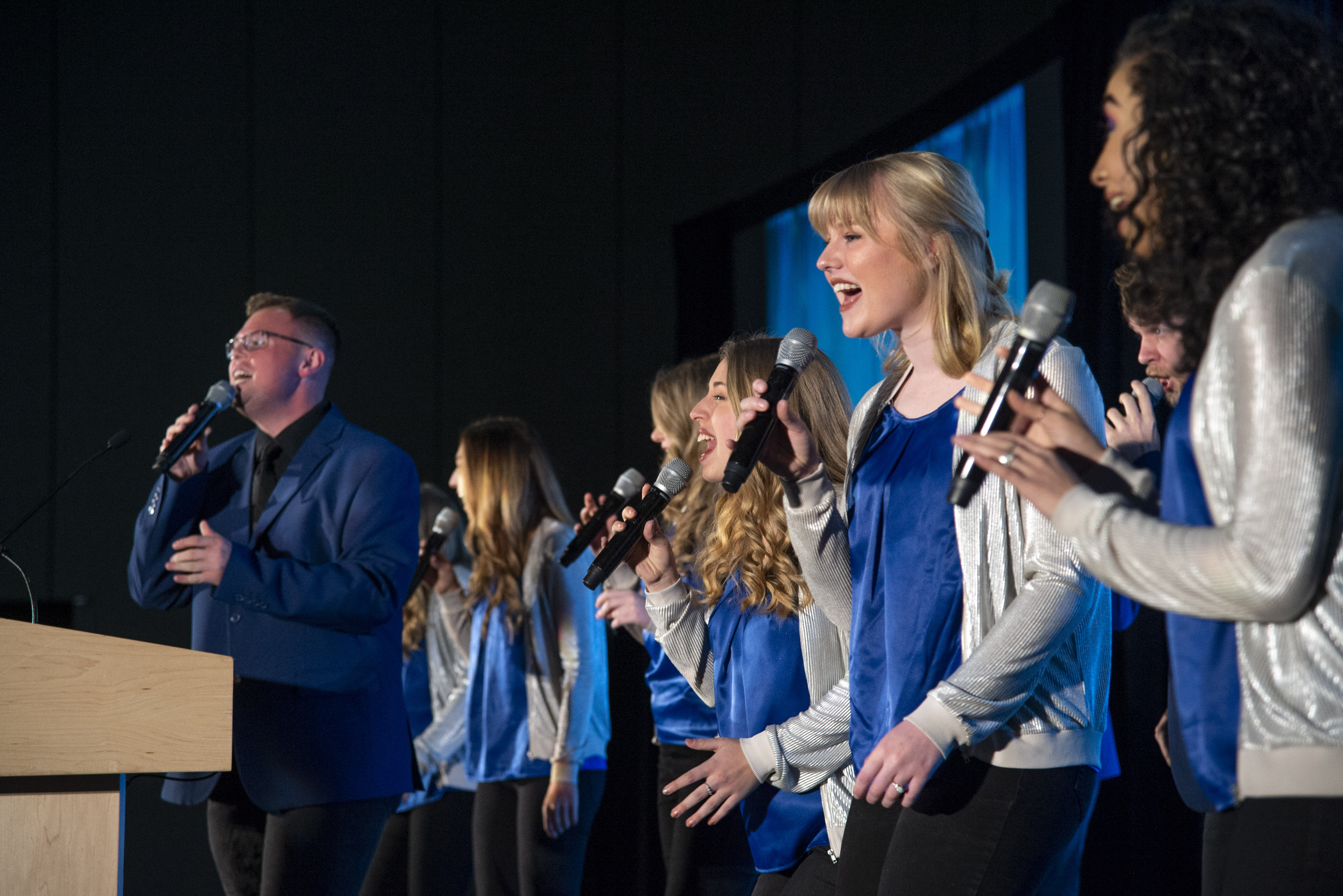 The Voices of Lee singers perform.