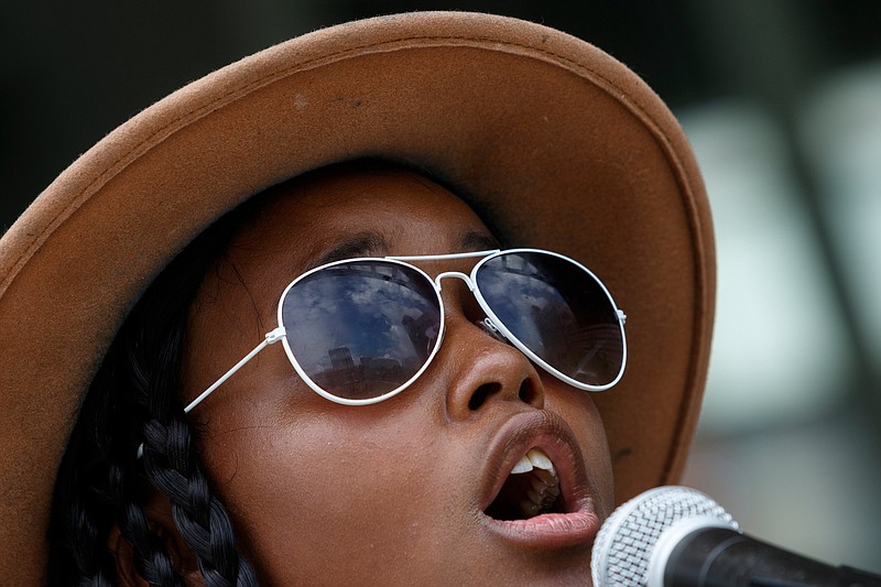 Terry Richer performs with the group Young Gifted & Black during a Juneteenth Celebration in Miller Park on Wednesday, June 19, 2019, in Chattanooga, Tenn. Juneteenth commemorates the abolition of slavery in the United States on June 19, 1865.