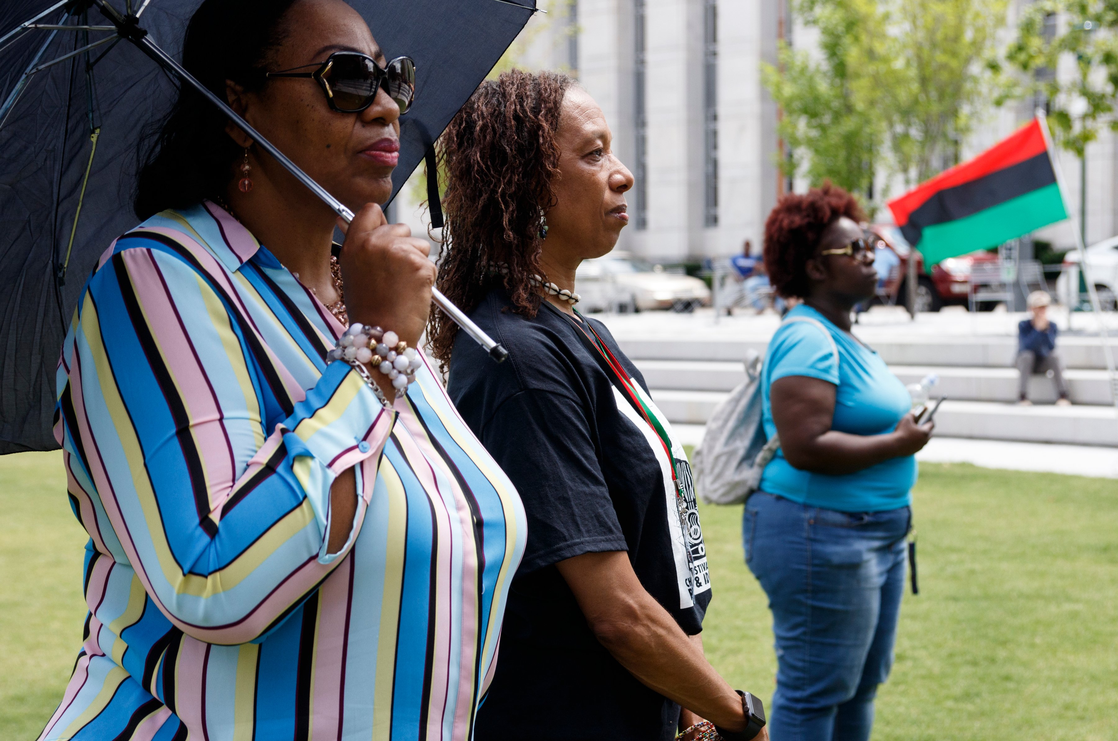 Barbara Shepherd, left, and Sheila Wofford listen during a Juneteenth Celebration in Miller Park on Wednesday, June 19, 2019, in Chattanooga, Tenn. Juneteenth commemorates the abolition of slavery in the United States on June 19, 1865.