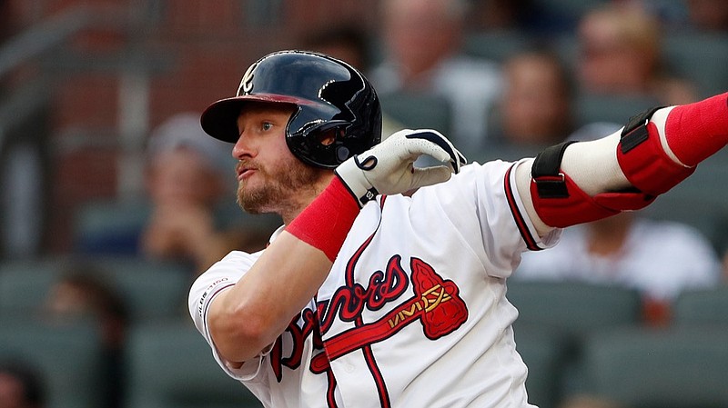 Atlanta Braves third baseman Josh Donaldson (20) is shown in a action against the New York Mets during a baseball game Monday, June 17, 2019, in Atlanta. (AP Photo/John Bazemore)

