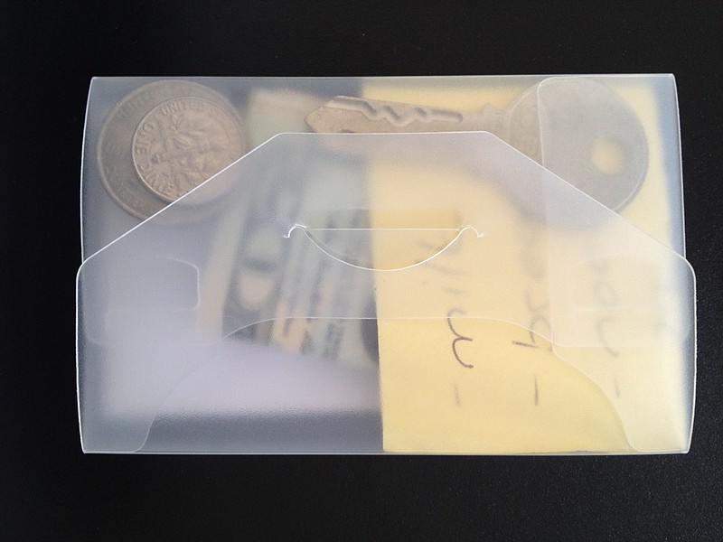 This undated photo provided by researchers in June 2019 shows an example of a transparent wallet used in an experiment to test how likely people are to return a lost wallet. "The evidence suggests that people tend to care about the welfare of others, and they have an aversion to seeing themselves as a thief," said Alain Cohn of the University of Michigan, one author who reported the results Thursday, June 20, 2019 in the journal Science. (Christian Z nd via AP)
