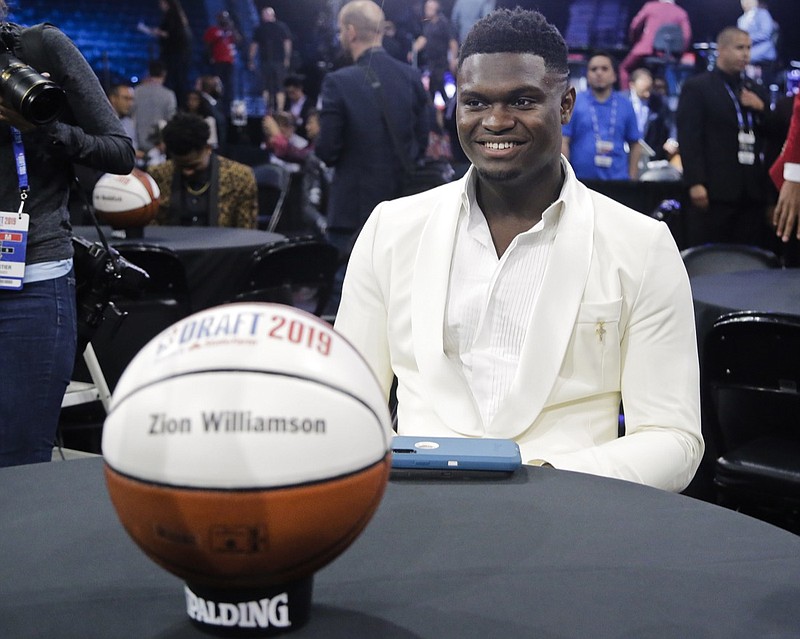 Zion Williamson, who starred for Duke in 2018-19, his lone season in college basketball, smiles before the NBA draft Thursday night in New York. Williamson, as expected, was taken No. 1 overall by the New Orleans Pelicans.