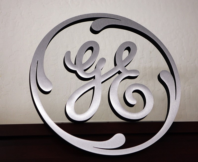In this Dec. 2, 2008, file photo, a General Electric sign is displayed at Western Appliance store in Mountain View, Calif.