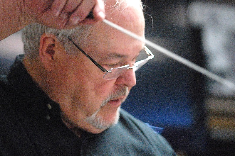 Gary Wilkes conducts a youth orchestra in April 2016.