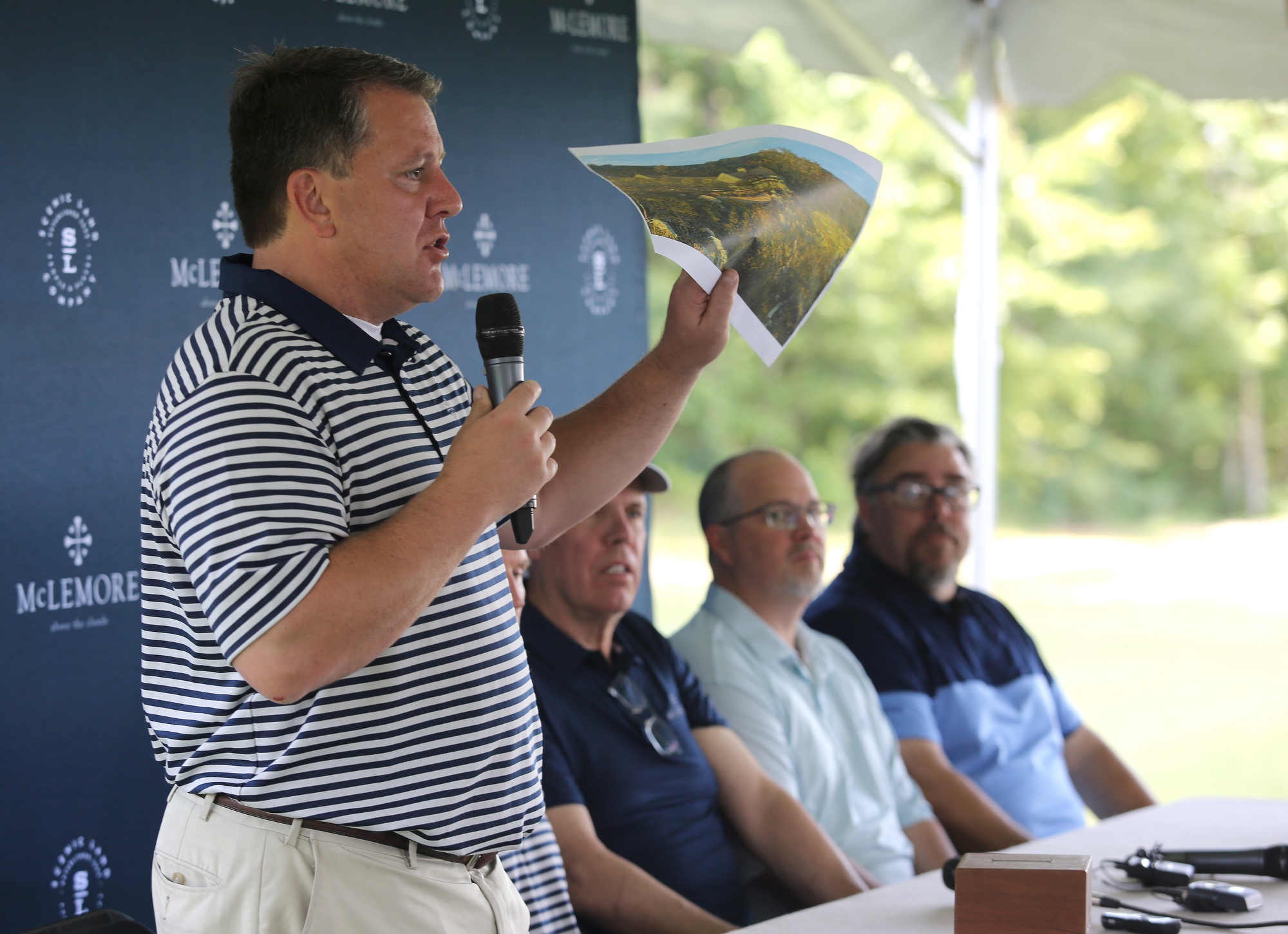 Duane Horton, president of Scenic Land Co., shows a rendering of the property during a press conference at The Course at McLemore on Lookout Mountain Friday, June 21, 2019 in Walker County, Ga. Scenic Land Co. took over the former Canyon Ridge development two years ago.
