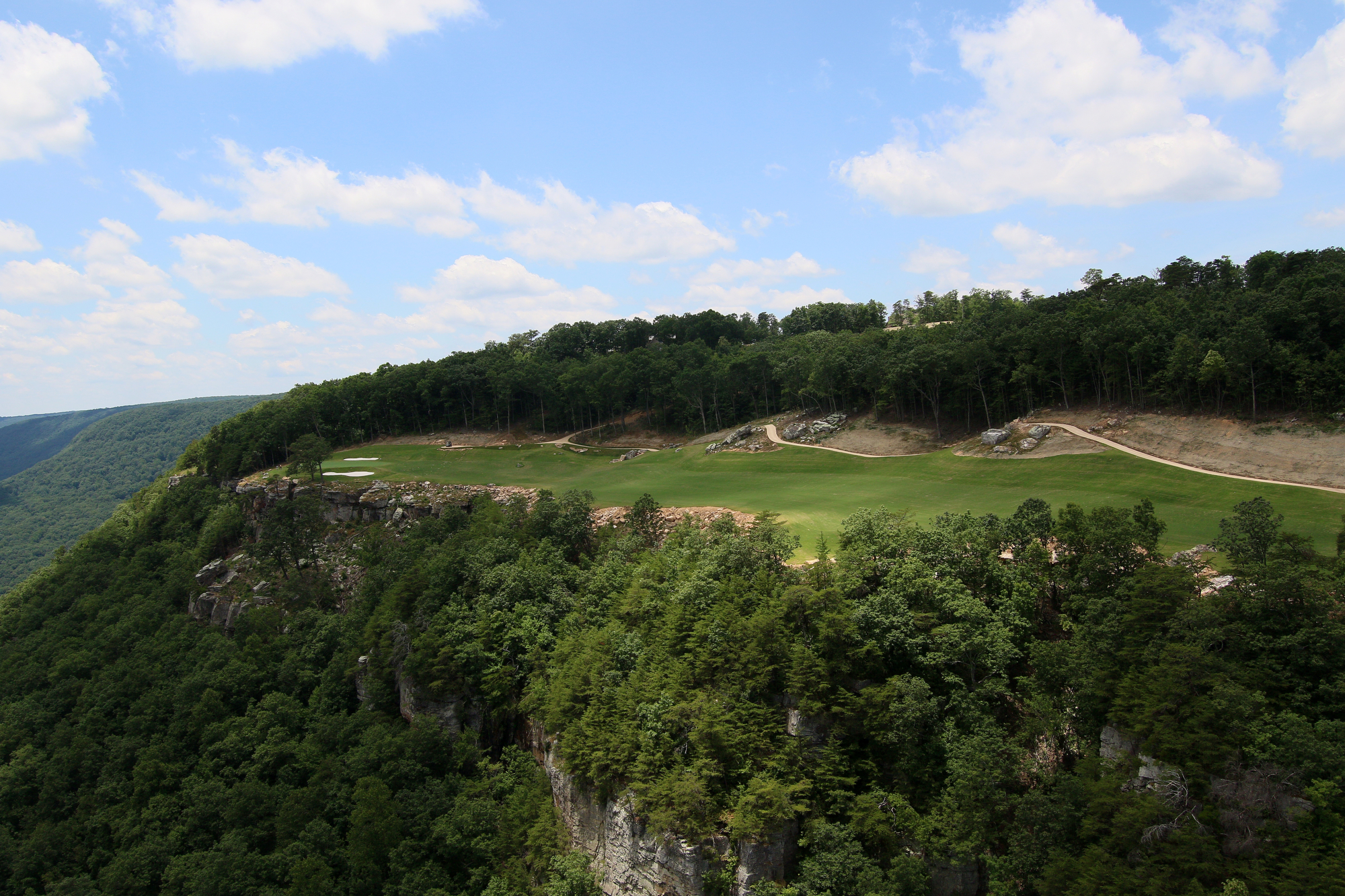 The 18th hole at The Course at McLemore is seen from a helicopter on Lookout Mountain Friday, June 21, 2019 in Walker County, Ga. The 18th hole sits on a perched terrace overlooking the valley below.