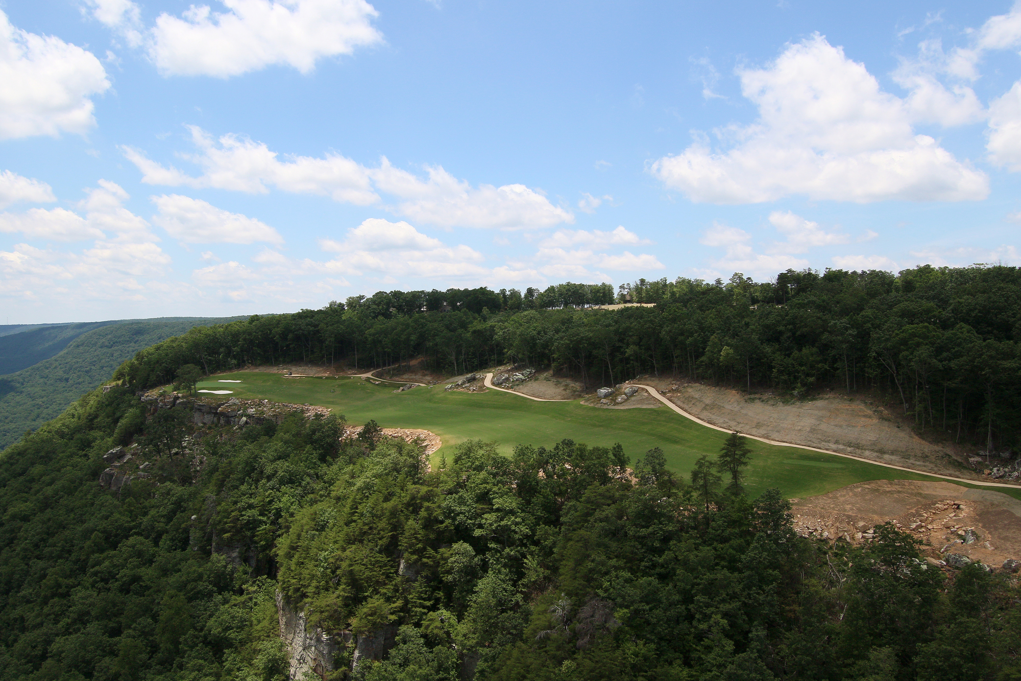 The 18th hole at The Course at McLemore is seen from a helicopter on Lookout Mountain Friday, June 21, 2019 in Walker County, Ga. The 18th hole sits on a perched terrace overlooking the valley below.