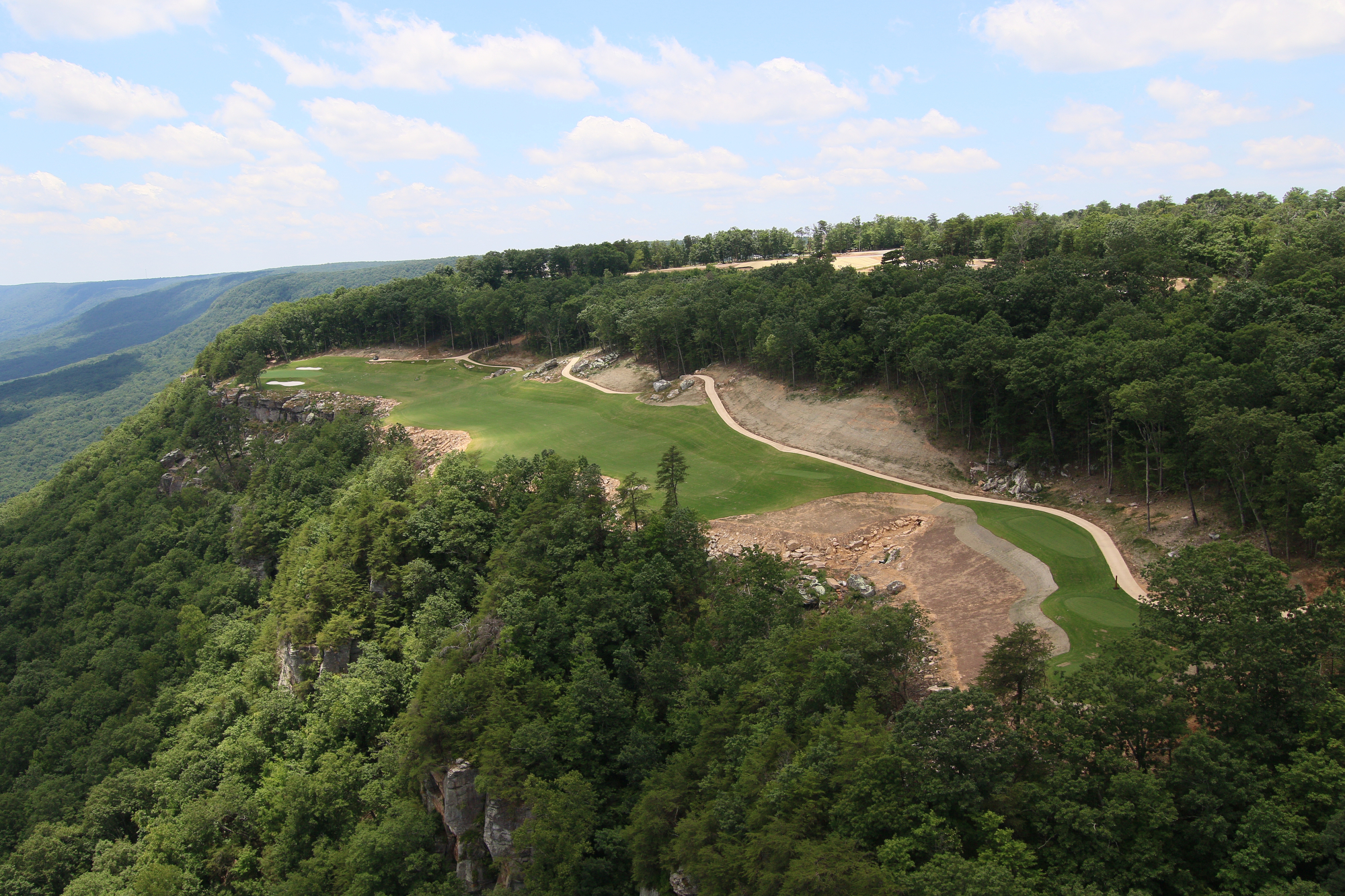 The 18th hole at The Course at McLemore is seen from a helicopter on Lookout Mountain Friday, June 21, 2019 in Walker County, Ga. The 18th hole sits on a perched terrace overlooking the valley below.
