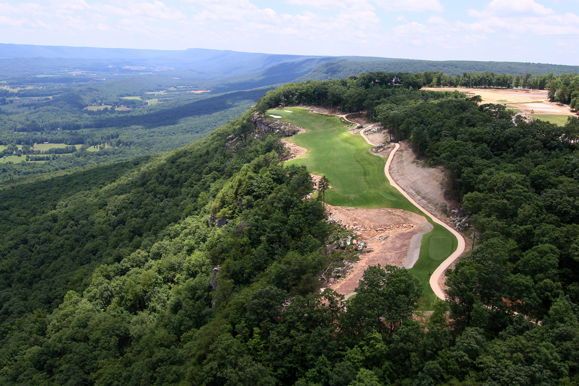 The 18th hole at The Course at McLemore is seen from a helicopter on Lookout Mountain Friday, June 21, 2019 in Walker County, Ga. The 18th hole sits on a perched terrace overlooking the valley below.