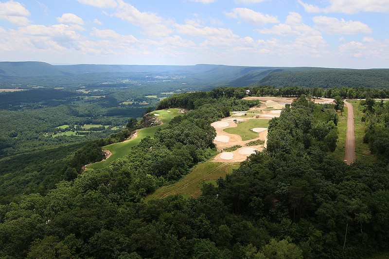 The 18th hole at The Course at McLemore is seen from a helicopter above Lookout Mountain in June 2019. The 18th hole sits on a perched terrace overlooking the valley below. / Staff photo by Erin O. Smith