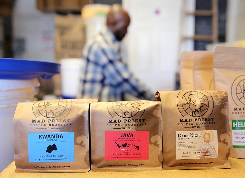 Coffee from different areas of the world sits out on a counter at Mad Priest Coffe, which aims not only to produce the best coffee, but also educate customers about roasting techniques and different cultures.