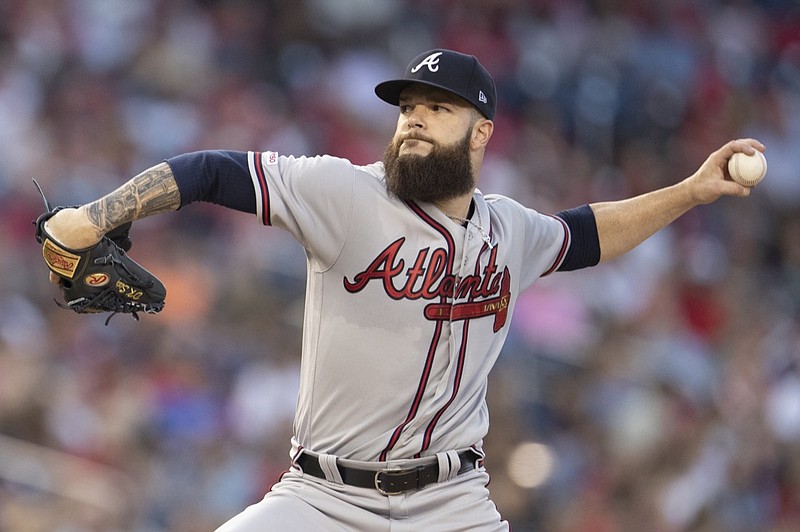 Dallas Keuchel pitches against the host Washington Nationals during the fourth inning of Friday night's game, his debut with the Atlanta Braves.