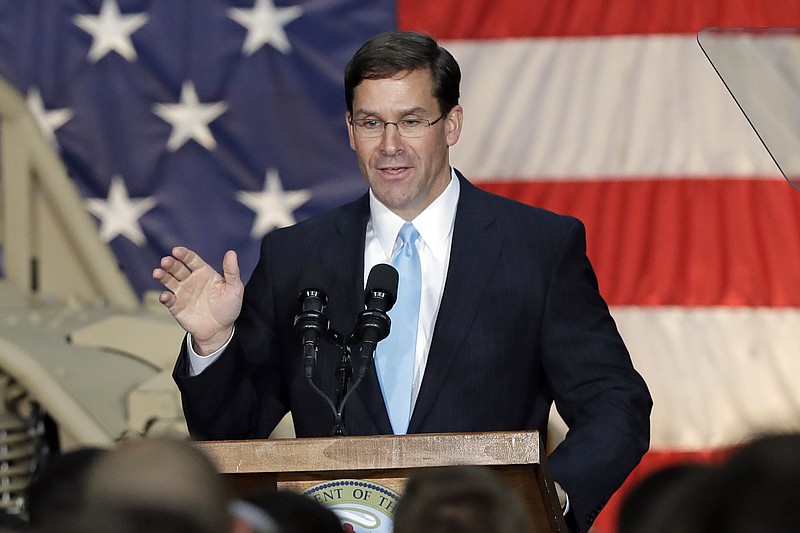 FILE - In this April 15, 2019, file photo, Secretary of the Army Mark Esper speaks to soldiers and family members in Ft. Bragg, N.C. It’s a difficult time for the Pentagon to be without a permanent U.S. defense secretary. Amid all that, and more, acting Defense Secretary Patrick Shanahan stepped down this week and Esper, the man tapped to replace him on an interim basis appears to face legal hurdles that could initially prevent him from serving more than about six more weeks. (AP Photo/Chuck Burton, File)