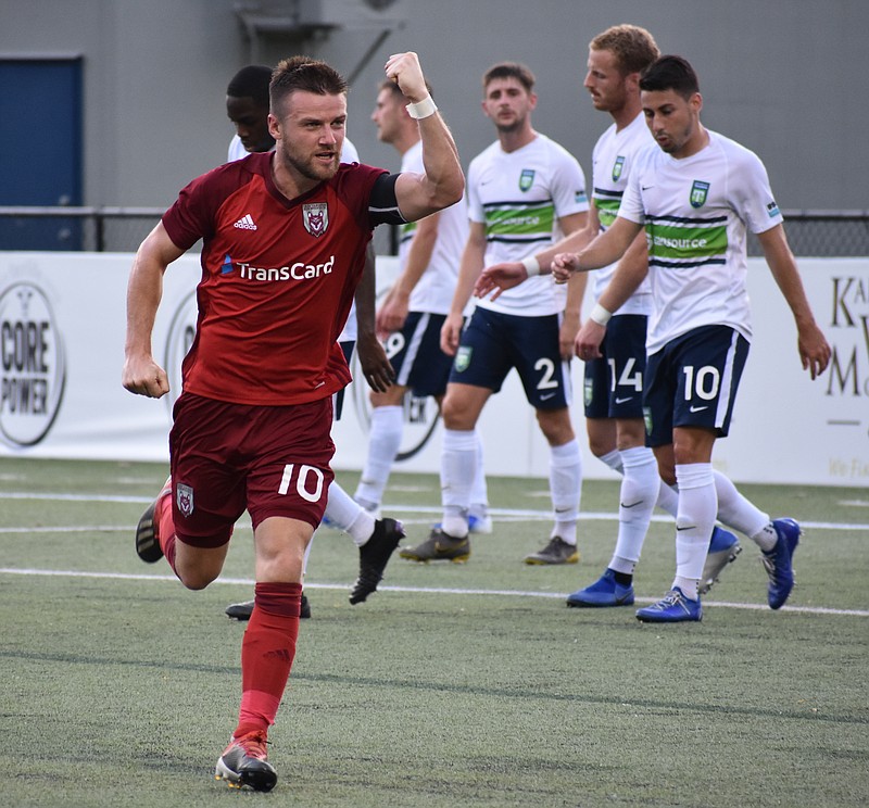 Chattanooga Red Wolves SC captain Steven Beattie celebrates after scoring off a corner kick in the 18th minute of Saturday night's home match against Greenville Triumph SC. Beattie had all of the Red Wolves' goals as they won 3-2.