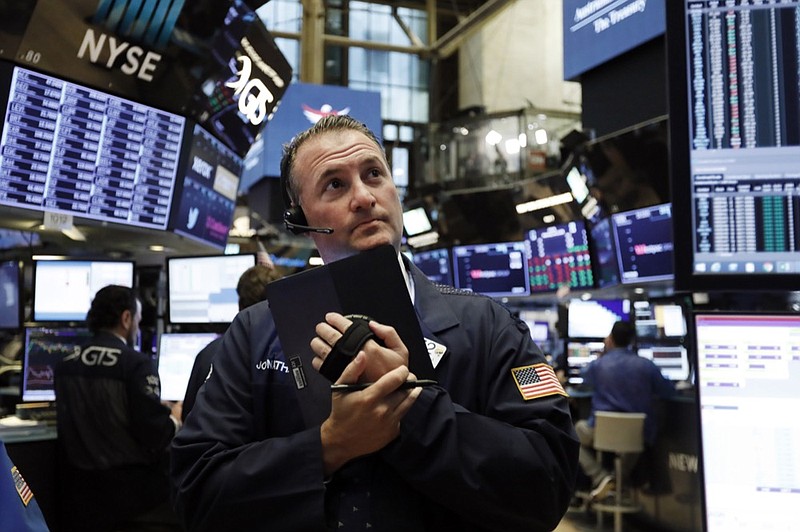 Trader Jonathan Corpina works on the floor of the New York Stock Exchange, Wednesday, June 19, 2019. Investors are in wait-and-see mode hours ahead of a widely anticipated Federal Reserve decision on interest rates. (AP Photo/Richard Drew)

