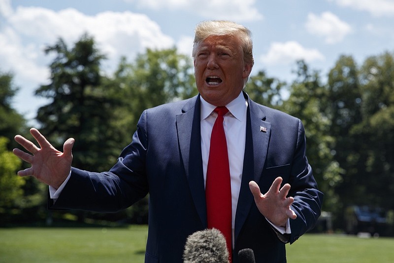President Donald Trump talks with reporters on the South Lawn of the White House before departing to Japan for the G-20 summit, Wednesday, June 26, 2019, in Washington. (AP Photo/Evan Vucci)