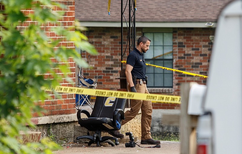 Staff photo by Doug Strickland / 
Investigators work the scene of a shooting in the 1500 block of Bradt Street on Thursday, June 27, 2019, in Chattanooga, Tenn. 
