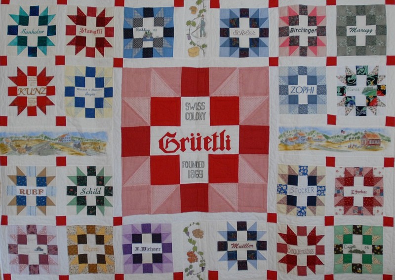 A quilt bearing the names of the families that founded the Swiss colony in 1869 hangs in the Stocker-Stampfli Farm Museum in Gruetli-Laager, Tenn., on Tuesday. The Grundy County Swiss Historical Society will host its annual Swiss heritage celebration on Saturday.