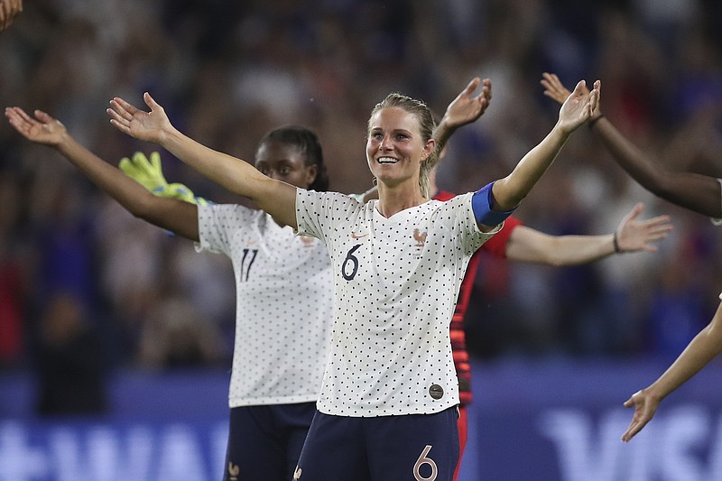 France's Amandine Henry celebrates after her team beat Brazil 2-1 in a Women's World Cup match Sunday in Le Havre, France. The fourth-ranked French face the top-ranked United States in a quarterfinal in Paris.