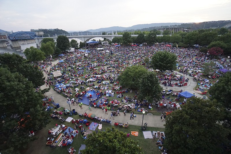 A crowd fills Coolidge park for a previous Pops on the River concert.