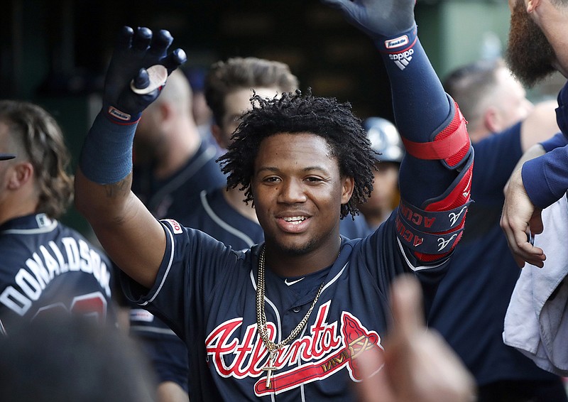 AP photo / Atlanta Braves outfielder Ronald Acuna Jr., an All-Star last season, and his teammates will soon be back together and preparing for a short 60-game season in which avoiding injuries and illness — including COVID-19 — is imperative.