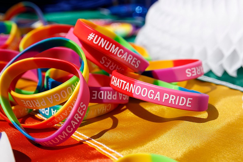 Chattanooga pride wristbands are offered during the Chattanooga Area Chamber of Commerce's 2019 Pride Month Networking event at Miller Park on Friday, June 28, 2019, in Chattanooga, Tenn. The networking event to promote LGBTQ businesses and diversity coincided with the the 50th anniversary of the Stonewall Uprising, which began the modern gay rights movement.