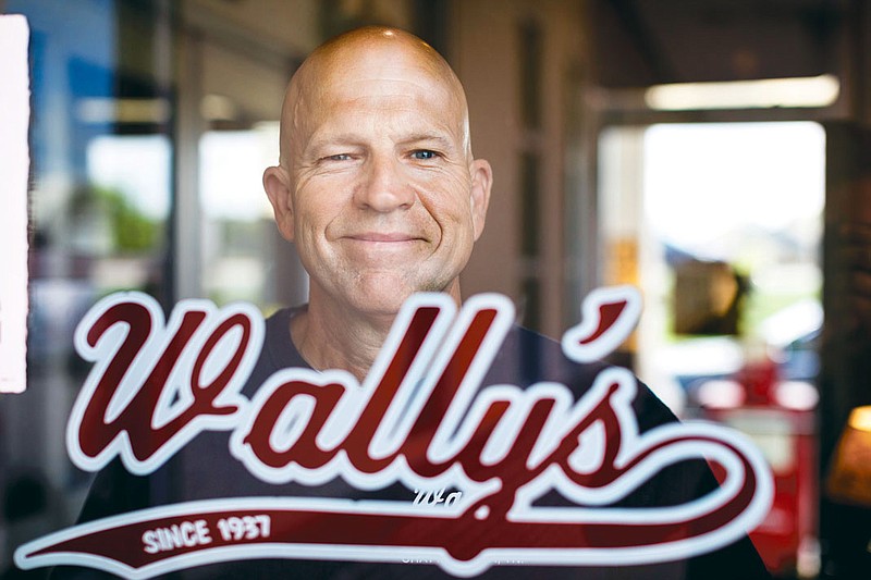 Glen Meadows, owner and manager of Wally's Restaurant's East Ridge location, stands inside the restaurant.