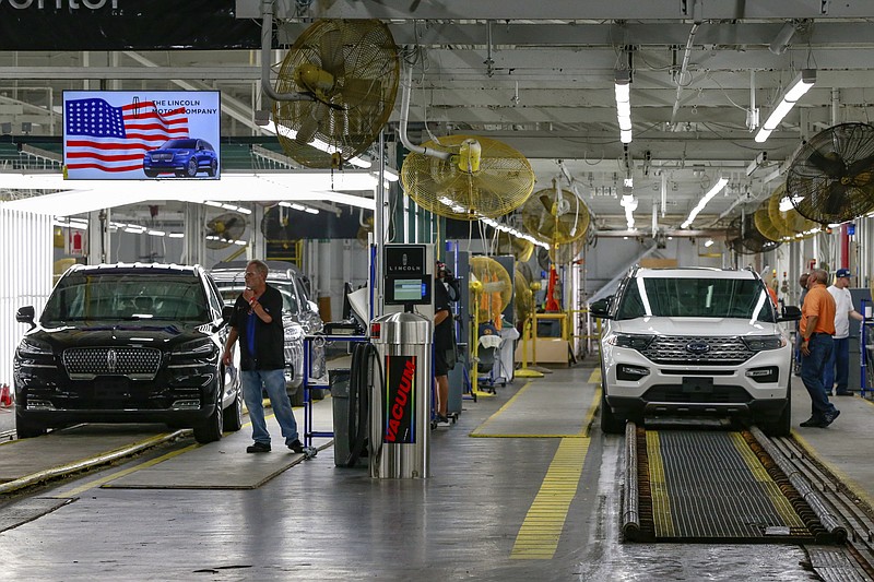FILE - In this June 24, 2019, file photo Ford's employees work on a Lincoln Aviator and Ford Explorer lines at Ford's Chicago Assembly Plant in Chicago. On Monday, July 1, the Institute for Supply Management, a trade group of purchasing managers, issues its index of manufacturing activity for June. (AP Photo/Amr Alfiky, File)