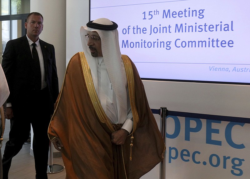 Khalid Al-Falih, Minister of Energy, Industry and Mineral Resources of Saudi Arabia arrives for a meeting of the Organization of the Petroleum Exporting Countries, OPEC, and non OPEC members at their headquarters in Vienna, Austria, Monday, July 1, 2019. (AP Photo/Ronald Zak)