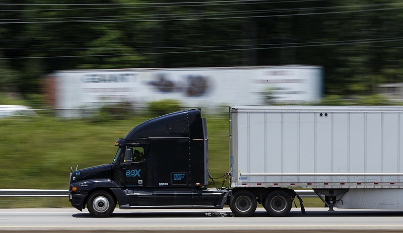 A tractor-trailer drives along I-75 South on Monday, July 1, 2019 in Cleveland, Tenn.