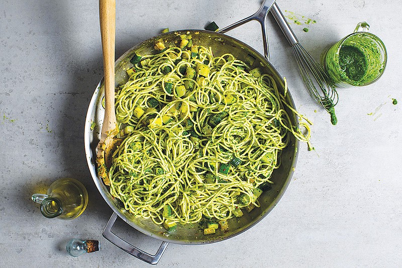 Spaghetti with zucchini and parsley pesto. Bright, briny bottarga, a Mediterranean delicacy, tops this take on zucchini pasta. (Andrew Scrivani/The New York Times)