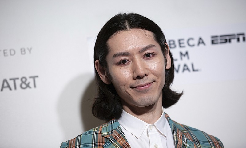 FILE - This April 26, 2019 file photo shows competitive eater Takeru Kobayashi attending the screening for "Tribeca/ESPN Sports Film Festival Gala: The Good, The Bad, The Hungry" during the 2019 Tribeca Film Festival in New York. Premiering Tuesday, July 2, on ESPN, the documentary comes two days before the annual Nathan’s Famous International Hot Dog Eating Contest that brought Kobayashi to prominence in the competitive eating arena. (Photo by Brent N. Clarke/Invision/AP)