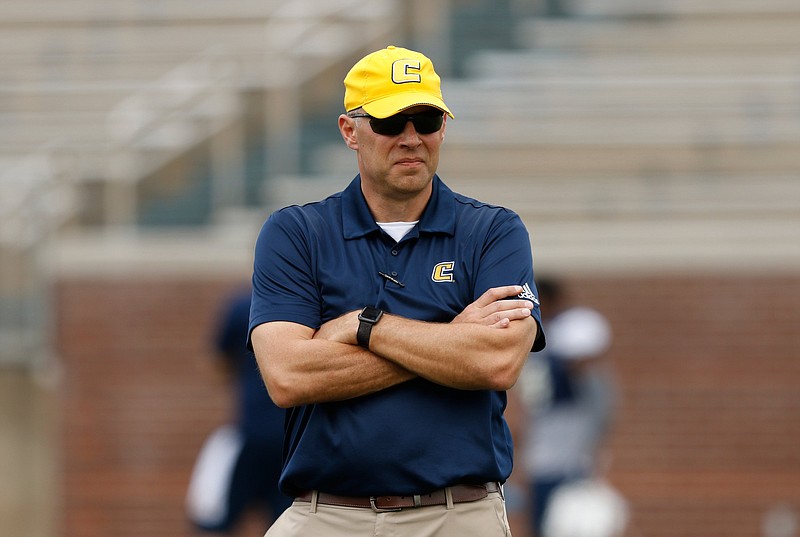 Chattanooga head football coach Rusty Wright watches during the University of Tennessee at Chattanooga spring football scrimmage at Finley Stadium on Saturday, March 30, 2019, in Chattanooga, Tenn. 