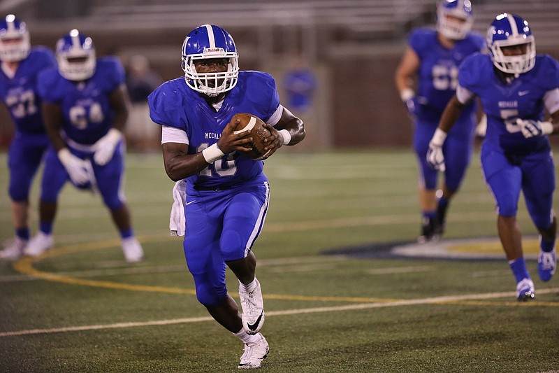 McCallie quarterback DeAngelo Hardy (10) runs with the ball during the McCallie vs. Bradley Central game in the Best of Preps football jamboree Friday, August 10, 2018 at Finley Stadium in Chattanooga, Tennessee. 